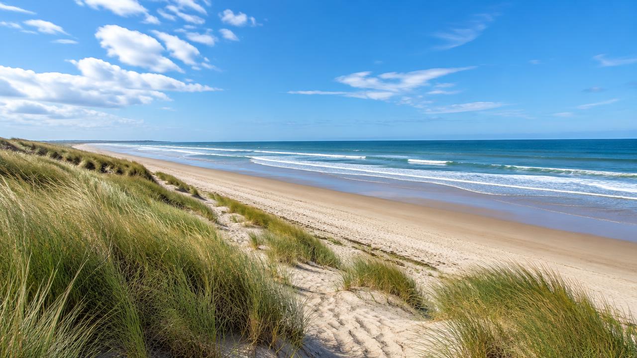 Wide Atlantic beach with dunes on the Vendée coast